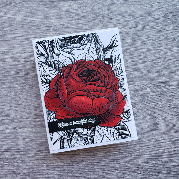 Guest designer Daniel West creating with Brutus Monroe's Enchanted Rose background stamp