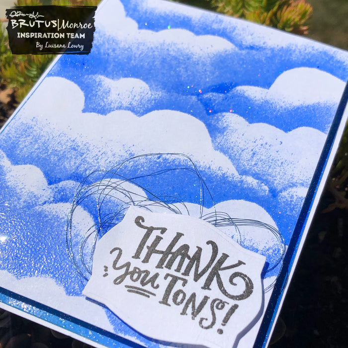 Cloud stenciling with this month’s embossing powder