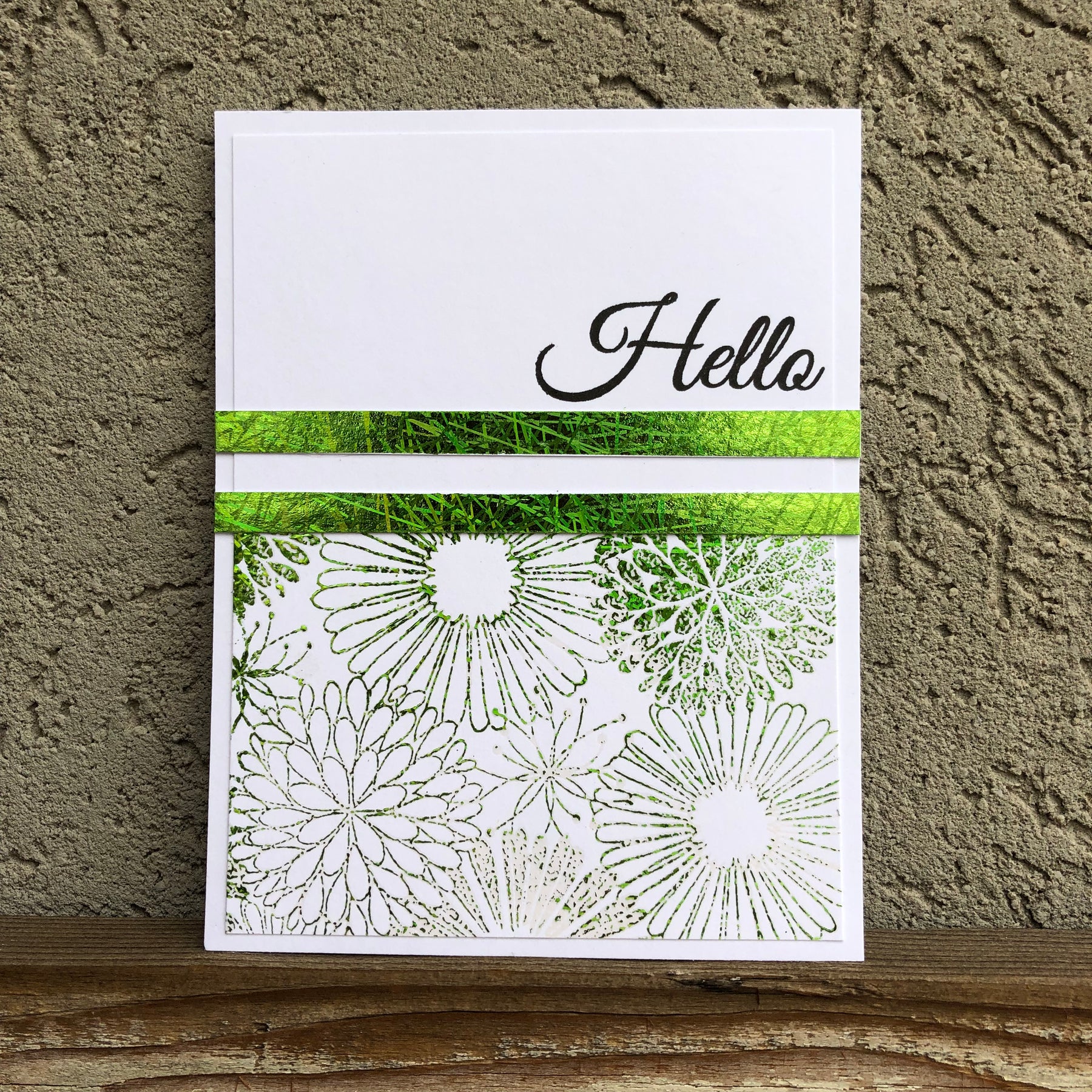Stamping foil using embossing ink and powders.