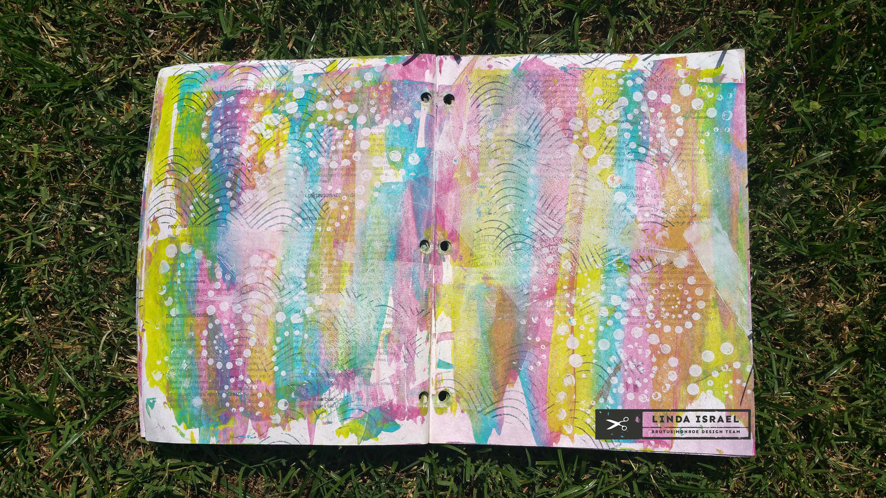 Altered workbook with Paint Stamps Stencils and Glimmer Mists