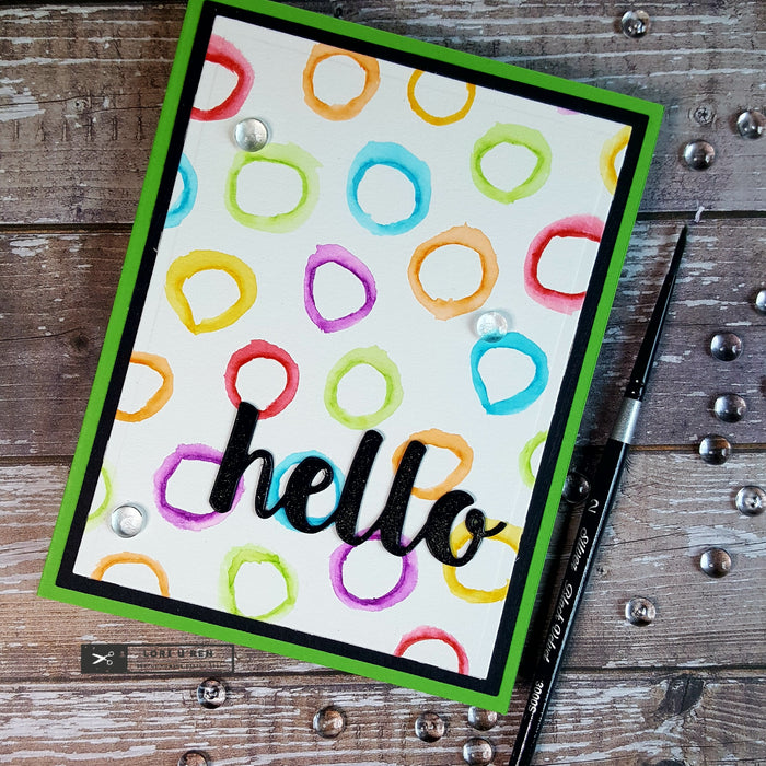 Creating a Background With Stencils and Watercolor Markers