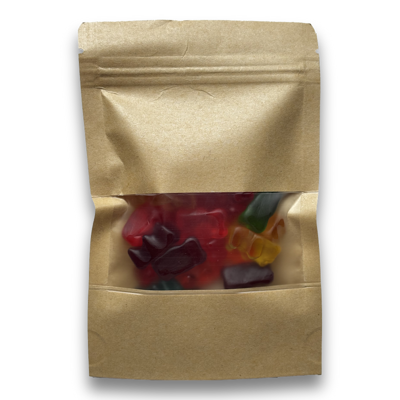 Kraft paper snack bag with colorful gummy bears inside on a white background