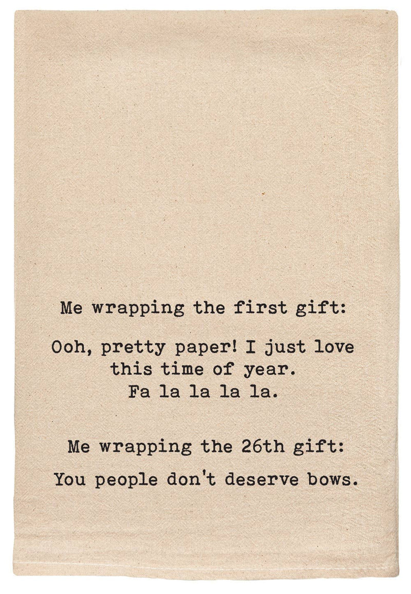 Me wrapping the first gift: Ooh pretty paper! Tea Towel