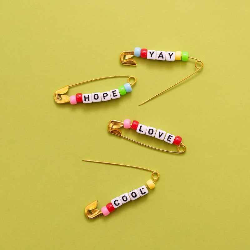 Jen Hadfield | Reaching Out Metal Safety Pins | W/Phrase Beads